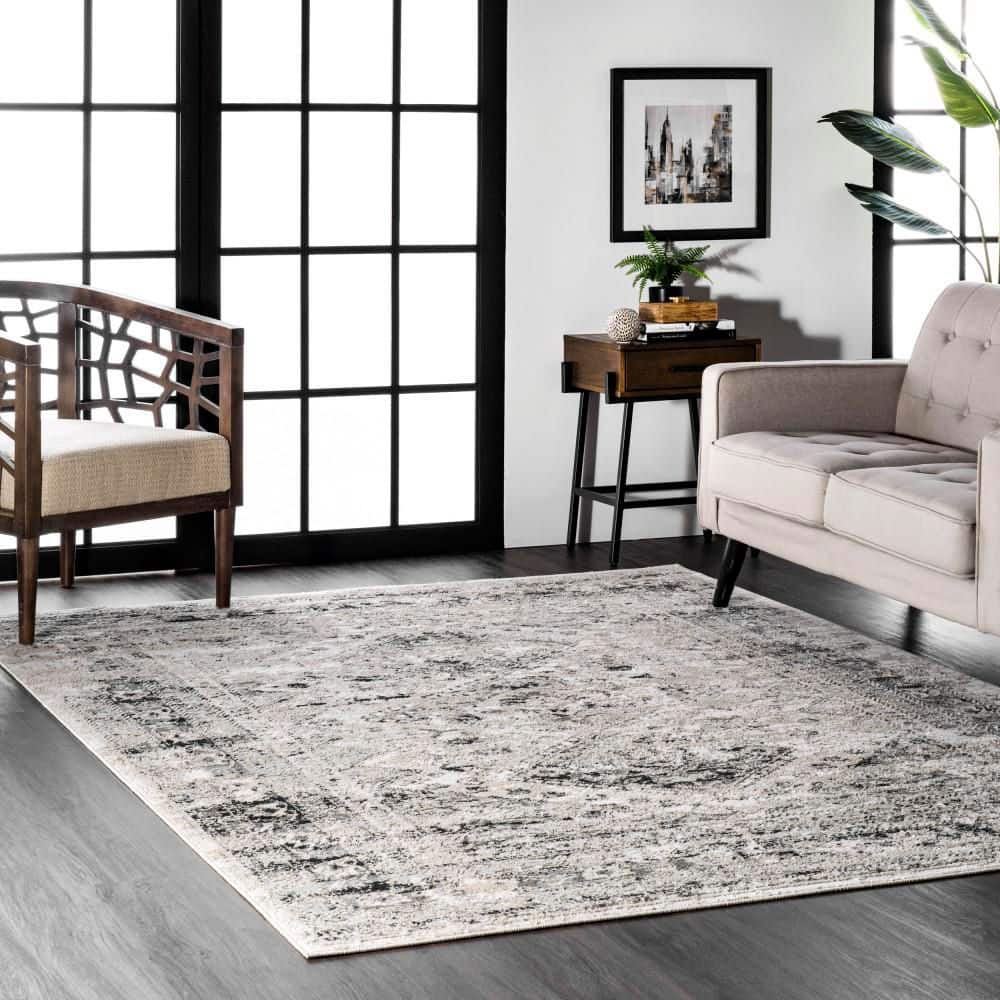 Shaunte Faded Vintage 9 ft. x 12 ft. Silver Indoor Area Rug - Hercitys