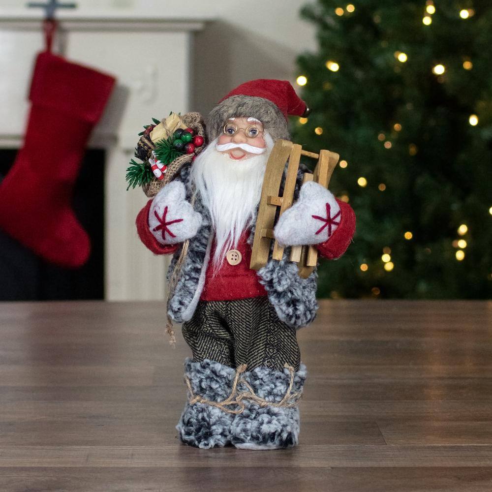 12 in. Standing Santa Christmas Figure Carrying Presents and a Sled - Hercitys