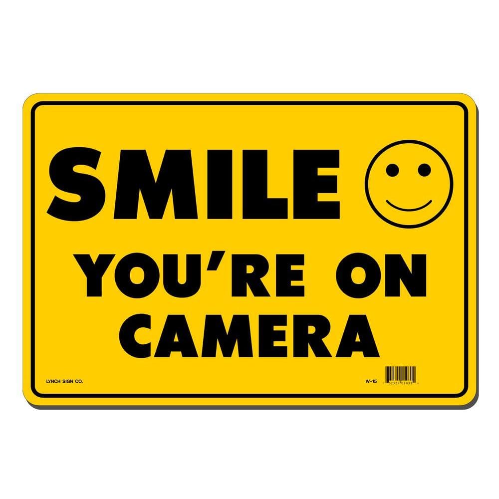 14 in. x 10 in. Smile You’re on Camera Sign Printed on More Durable, Thicker, Longer Lasting Styrene Plastic - Hercitys